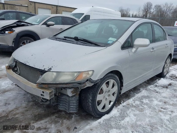 2011 Honda Civic Sdn LX with VIN 2HGFA1F54BH520203, listed as a IAAI auction lot 41708981 with 176,451 mi miles. Bid and sale history available at carsss.com. Image 2.