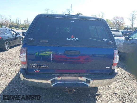 2014 Toyota Tacoma with VIN 3TMLU4EN4EM154261, listed as a IAAI auction lot 42119237 with 211,929 mi miles and . Bid and sale history available at DreamBid. Image 17.