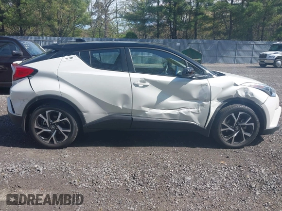 2019 Toyota C-HR XLE with VIN NMTKHMBX5KR097682, listed as a IAAI auction lot 42145372 with 11,003 mi miles and . Bid and sale history available at DreamBid. Image 13.