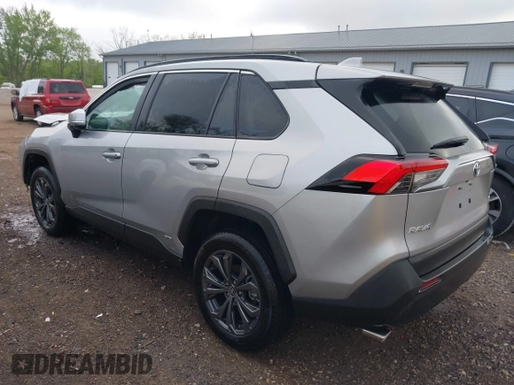 2024 Toyota RAV4 Hybrid XLE Premium z VIN 4T3B6RFV2RU151316, wystawiony jako IAAI lot #42171500 z przebiegiem 4 801 mil mil oraz . Historia ofert i sprzedaży dostępna na DreamBid. Obrazek 3.