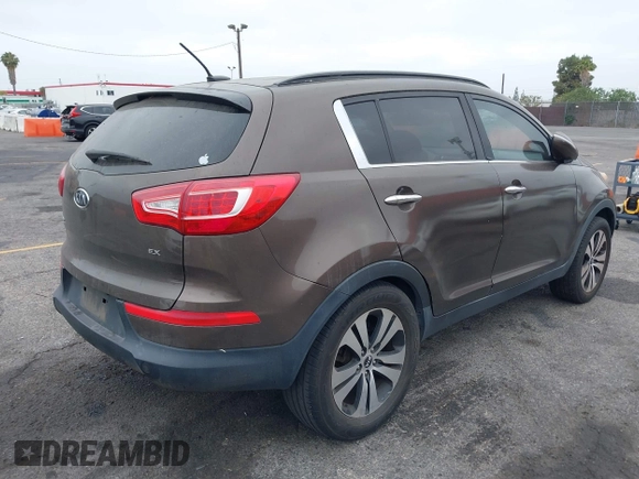 2011 Kia Sportage EX with VIN KNDPC3A21B7061942, listed as a IAAI auction lot 42537500 with Not provided miles and . Bid and sale history available at DreamBid. Image 4.