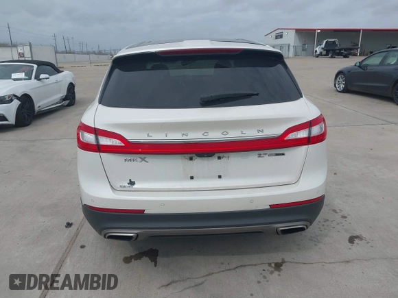 2016 Lincoln MKX Reserve with VIN 2LMPJ6LP8GBL33580, listed as a IAAI auction lot 41749632 with 100,579 mi miles. Bid and sale history available at carsss.com. Image 16.
