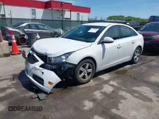 2014 Chevrolet Cruze 1LT with VIN 1G1PC5SB4E7354774, listed as a IAAI auction lot 42104388 with 136,532 mi miles and . Bid and sale history available at DreamBid. Image 17.