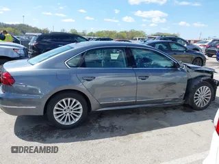 2017 Volkswagen Passat SE with VIN 1VWBT7A3XHC015940, listed as a IAAI auction lot 42027997 with 28,442 mi miles and . Bid and sale history available at DreamBid. Image 14.