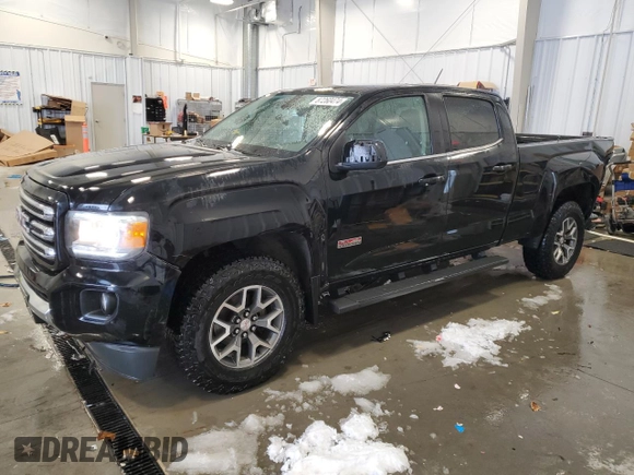 2015 GMC Canyon 4WD SLE with VIN 1GTG6BE35F1119242, listed as a Copart auction lot 87260474 with 184,286 mi miles and Clean Title. Bid and sale history available at carsss.com. Image 1.