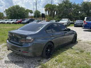 2013 BMW 3 Series 328i with VIN WBA3A5G53DNP19158, listed as a Copart auction lot 61036925 with 173,331 mi miles and Clean title. Bid and sale history available at DreamBid. Image 4.