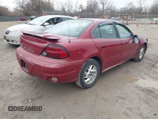 2004 Pontiac Grand Am SE with VIN 1G2NE52F14M652117, listed as a IAAI auction lot 41747762 with 187,422 mi miles. Bid and sale history available at carsss.com. Image 4.