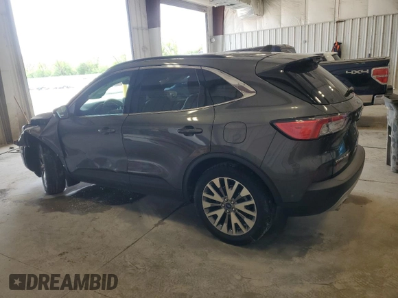 2020 Ford Escape Titanium Hybrid with VIN 1FMCU9DZ7LUA95938, listed as a Copart auction lot 58720595 with 49,963 mi miles and Salvage title. Bid and sale history available at DreamBid. Image 2.