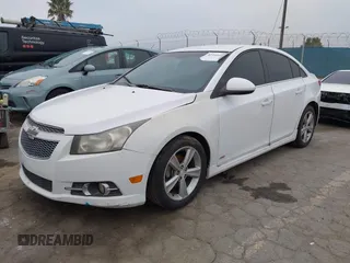 2012 Chevrolet Cruze 2LT with VIN 1G1PG5SCXC7300728, listed as a IAAI auction lot 42109318 with 144,659 mi miles and . Bid and sale history available at DreamBid. Image 2.
