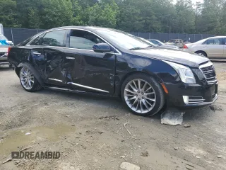 2014 Cadillac XTS Platinum z VIN 2G61W5S86E9151010, wystawiony jako Copart lot #58155335 z przebiegiem 48 437 mil mil oraz Szkoda całkowita • Salvage title. Historia ofert i sprzedaży dostępna na DreamBid. Obrazek 4.