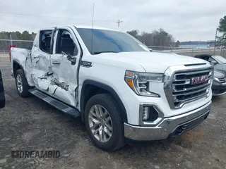 2020 GMC Sierra 1500 SLT z VIN 3GTU9DEDXLG311896, wystawiony jako IAAI lot #41419616 z przebiegiem 118 255 mil mil oraz . Historia ofert i sprzedaży dostępna na DreamBid. Obrazek 1.