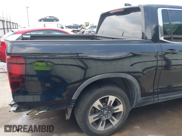 2017 Honda Ridgeline RTL z VIN 5FPYK2F55HB011463, wystawiony jako IAAI lot #42139030 z przebiegiem 59 066 mil mil oraz . Historia ofert i sprzedaży dostępna na DreamBid. Obrazek 22.