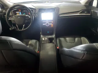 2020 Ford Fusion Titanium with VIN 3FA6P0D98LR107595, listed as a Copart auction lot 62261745 with 102,683 mi miles and Clean title. Bid and sale history available at DreamBid. Image 8.