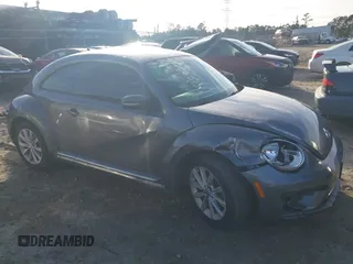 2017 Volkswagen Beetle 1.8T SE with VIN 3VWJ17AT5HM615698, listed as a IAAI auction lot 41099515 with 26,111 mi miles. Bid and sale history available at carsss.com. Image 13.