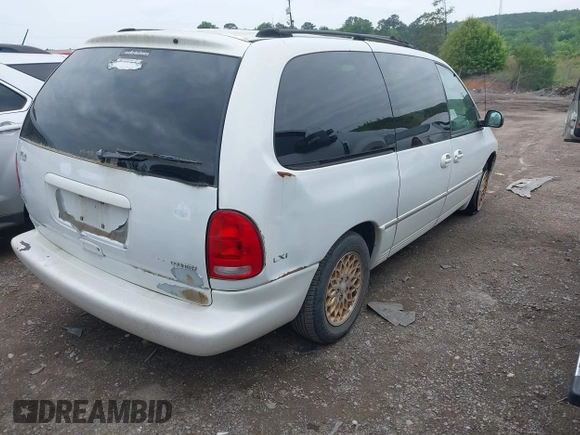 1998 Chrysler Town & Country LXi with VIN 1C4GP64L9WB664179, listed as a IAAI auction lot 42041600 with Not Provided miles. Bid and sale history available at carsss.com. Image 4.