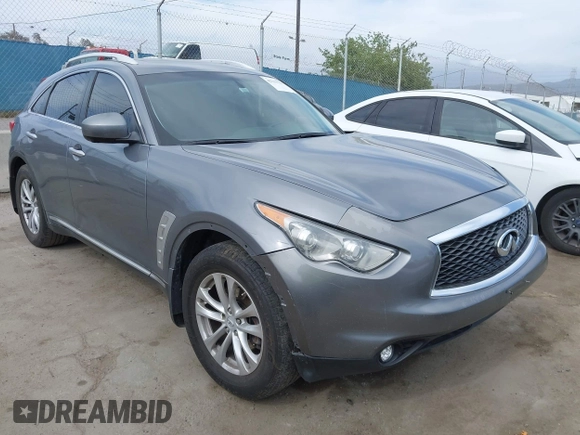 2014 Infiniti QX70 with VIN JN8CS1MU8EM450428, listed as a IAAI auction lot 42233727 with 88,342 mi miles and . Bid and sale history available at DreamBid. Image 1.