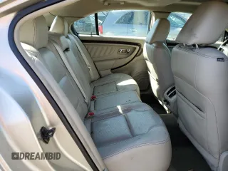2011 Ford Taurus Limited z VIN 1FAHP2FW4BG100365, wystawiony jako Copart lot #53994645 z przebiegiem 93 803 mil mil oraz Szkoda całkowita • Salvage title. Historia ofert i sprzedaży dostępna na DreamBid. Obrazek 10.