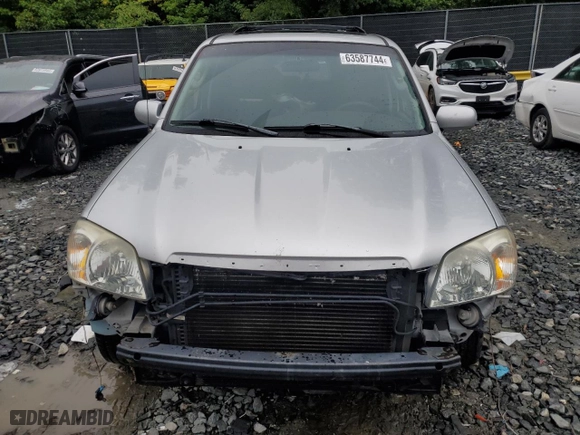 2005 Mazda Tribute LX with VIN 4F2YZ94185KM47932, listed as a Copart auction lot 63587744 with 203,178 mi miles and Salvage Title. Bid and sale history available at carsss.com. Image 5.