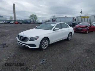 2017 Mercedes-Benz E with VIN WDDZF4KBXHA108620, listed as a IAAI auction lot 41935260 with 81,684 mi miles. Bid and sale history available at carsss.com. Image 2.