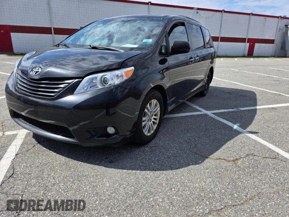 2015 Toyota Sienna XLE with VIN 5TDYK3DC2FS677415, listed as a Copart auction lot 54703175 with 275,971 mi miles and Clean Title. Bid and sale history available at carsss.com. Image 2.