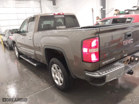 2014 GMC Sierra 1500 SLT with VIN 1GTV2VEC9EZ153530, listed as a IAAI auction lot 41647250 with 124,171 mi miles. Bid and sale history available at carsss.com. Image 3.