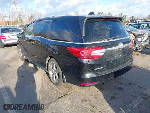 2019 Honda Odyssey EX-L with VIN 5FNRL6H74KB061567, listed as a IAAI auction lot 41810919 with 129,146 mi miles. Bid and sale history available at carsss.com. Image 3.
