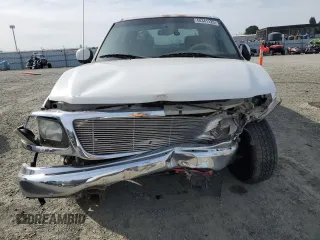 2003 Ford F-150 XLT with VIN 1FTRW07653KB64255, listed as a Copart auction lot 48341125 with 324,912 mi miles and Salvage Title. Bid and sale history available at carsss.com. Image 5.