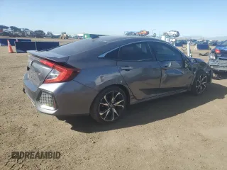 2018 Honda Civic Si with VIN 2HGFC1E57JH704397, listed as a Copart auction lot 51868535 with 44,620 mi miles and Salvage Title. Bid and sale history available at DreamBid. Image 3.