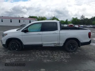 2023 Honda Ridgeline Black Edition with VIN 5FPYK3F88PB018969, listed as a IAAI auction lot 42264424 with 19,193 mi miles and . Bid and sale history available at DreamBid. Image 14.
