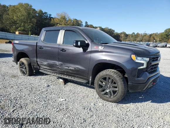 2022 Chevrolet Silverado 1500 LT Trail Boss with VIN 3GCUDFED2NG561825, listed as a Copart auction lot 77632284 with 34,448 mi miles and Salvage Title. Bid and sale history available at DreamBid. Image 4.