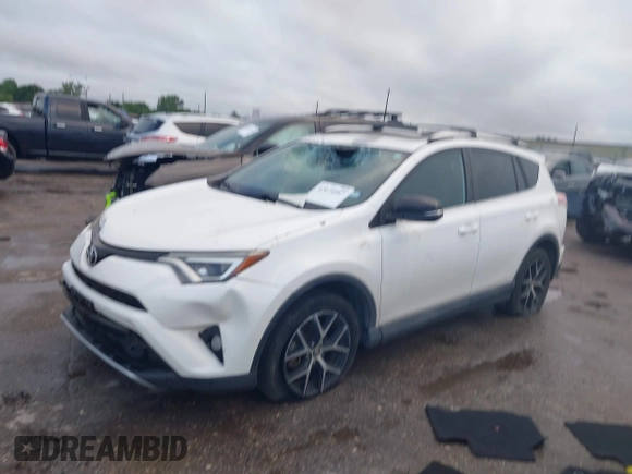 2016 Toyota RAV4 SE with VIN 2T3NFREV6GW262348, listed as a IAAI auction lot 42074087 with 114,791 mi miles and . Bid and sale history available at DreamBid. Image 2.
