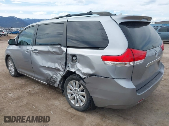 2014 Toyota Sienna Limited with VIN 5TDDK3DC7ES088938, listed as a IAAI auction lot 41885658 with 105,758 mi miles and . Bid and sale history available at DreamBid. Image 3.