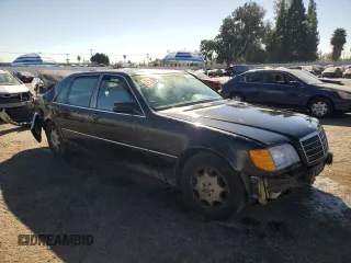 1994 Mercedes-Benz S with VIN WDBGA51E2RA184222, listed as a Copart auction lot 77403664 with 109,428 mi miles and Salvage Title. Bid and sale history available at DreamBid. Image 4.
