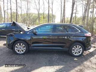 2022 Ford Edge Titanium with VIN 2FMPK4K95NBB06151, listed as a IAAI auction lot 41932545 with 57,762 mi miles and . Bid and sale history available at DreamBid. Image 14.