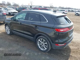 2015 Lincoln MKC with VIN 5LMTJ2AH0FUJ04461, listed as a IAAI auction lot 41804169 with 97,187 mi miles. Bid and sale history available at carsss.com. Image 3.