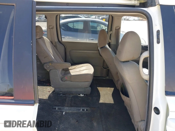 2011 Kia Sedona LX with VIN KNDMG4C79B6409885, listed as a IAAI auction lot 41971702 with 374,233 mi miles. Bid and sale history available at carsss.com. Image 8.
