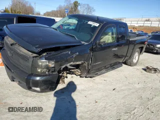 2010 Chevrolet Silverado 1500 LT with VIN 1GCSKSE30AZ269694, listed as a Copart auction lot 87296874 with 116,556 mi miles and Salvage Title. Bid and sale history available at DreamBid. Image 1.
