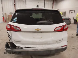 2018 Chevrolet Equinox LT z VIN 2GNAXSEV7J6138909, wystawiony jako IAAI lot #41295974 z przebiegiem 68 852 mil mil oraz . Historia ofert i sprzedaży dostępna na DreamBid. Obrazek 16.