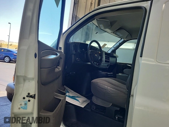 2012 Chevrolet Express Cargo with VIN 1GCWGFCA8C1179156, listed as a IAAI auction lot 42667299 with 168,910 mi miles and . Bid and sale history available at DreamBid. Image 14.