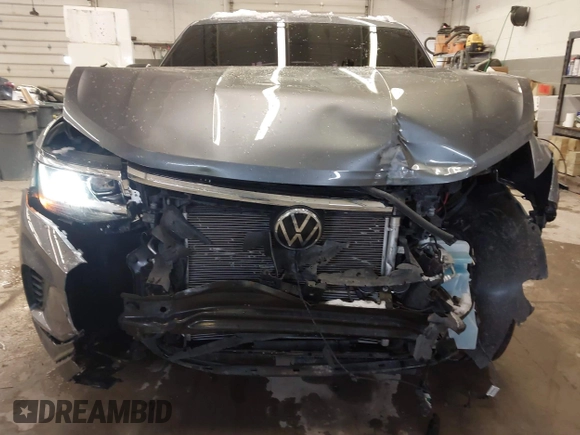 2022 Volkswagen Atlas SE with VIN 1V2LC2CA6NC202401, listed as a IAAI auction lot 41485676 with 31,101 mi miles and . Bid and sale history available at DreamBid. Image 6.