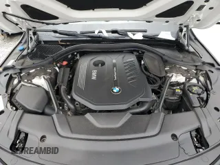 2016 BMW 7 Series 740i with VIN WBA7E2C52GG547112, listed as a Copart auction lot 63069355 with 76,867 mi miles and Salvage title. Bid and sale history available at DreamBid. Image 11.