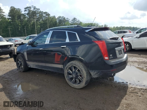 2015 Cadillac SRX Premium Collection with VIN 3GYFNDE32FS572480, listed as a Copart auction lot 54456725 with 82,573 mi miles and Salvage title. Bid and sale history available at DreamBid. Image 2.