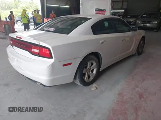 2014 Dodge Charger SE with VIN 2C3CDXBGXEH192832, listed as a IAAI auction lot 41029054 with 98,388 mi miles and . Bid and sale history available at DreamBid. Image 4.