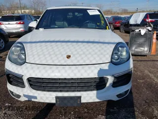 2016 Porsche Cayenne with VIN WP1AA2A20GKA36068, listed as a IAAI auction lot 41828945 with 86,938 mi miles. Bid and sale history available at carsss.com. Image 13.