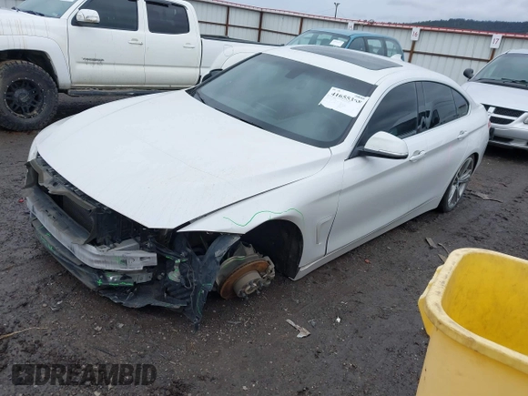 2016 BMW 4 Series 428i xDrive with VIN WBA4C9C54GG135615, listed as a IAAI auction lot 41655368 with 156,851 mi miles and . Bid and sale history available at carsss.com. Image 18.