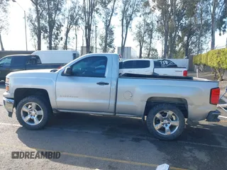 2014 Chevrolet Silverado 1500 with VIN 1GCNCREH2EZ303297, listed as a IAAI auction lot 41692877 with 115,621 mi miles and . Bid and sale history available at DreamBid. Image 14.