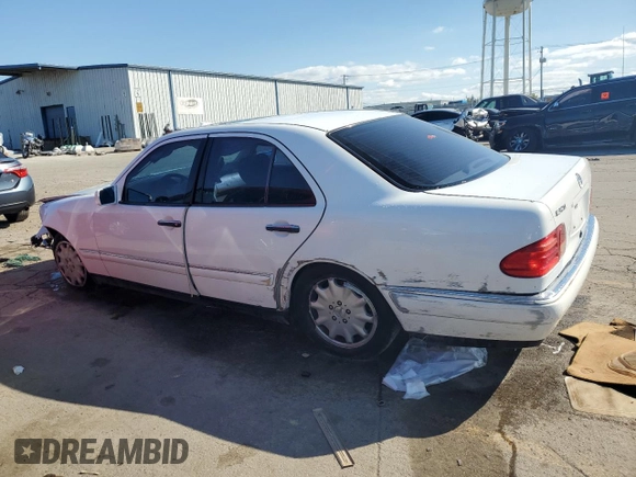 1999 Mercedes-Benz E-Class with VIN WDBJF65HXXA914389, listed as a Copart auction lot 72935884 with 192,084 mi miles and Salvage Title. Bid and sale history available at carsss.com. Image 2.