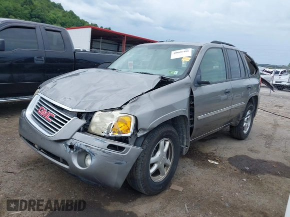 2007 GMC Envoy SLE with VIN 1GKDS13S272278285, listed as a IAAI auction lot 40006486 with 158,109 mi miles. Bid and sale history available at carsss.com. Image 2.