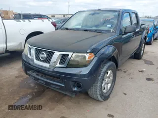 2013 Nissan Frontier SV with VIN 1N6AD0ER3DN746142, listed as a IAAI auction lot 41519017 with 166,482 mi miles and . Bid and sale history available at DreamBid. Image 2.