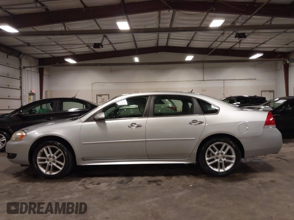 2014 Chevrolet Impala LTZ with VIN 2G1WC5E3XE1157931, listed as a IAAI auction lot 42688907 with 119,985 mi miles and . Bid and sale history available at DreamBid. Image 14.